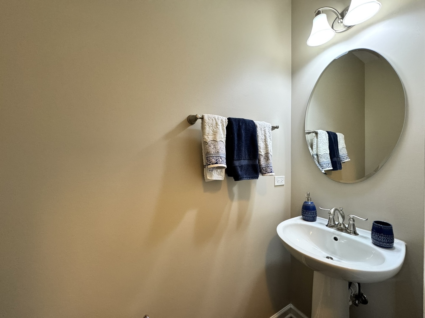 12903 Cypress Lane Plainfield, IL 60585 - Photo 25 of 30 a bathroom with a sink and a mirror