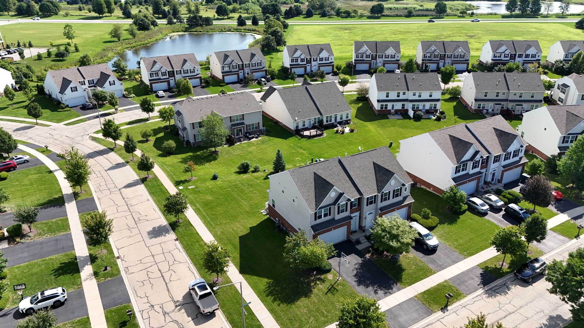 12903 Cypress Lane Plainfield, IL 60585 - Photo 28 of 30 an aerial view of a house with swimming pool and outdoor seating