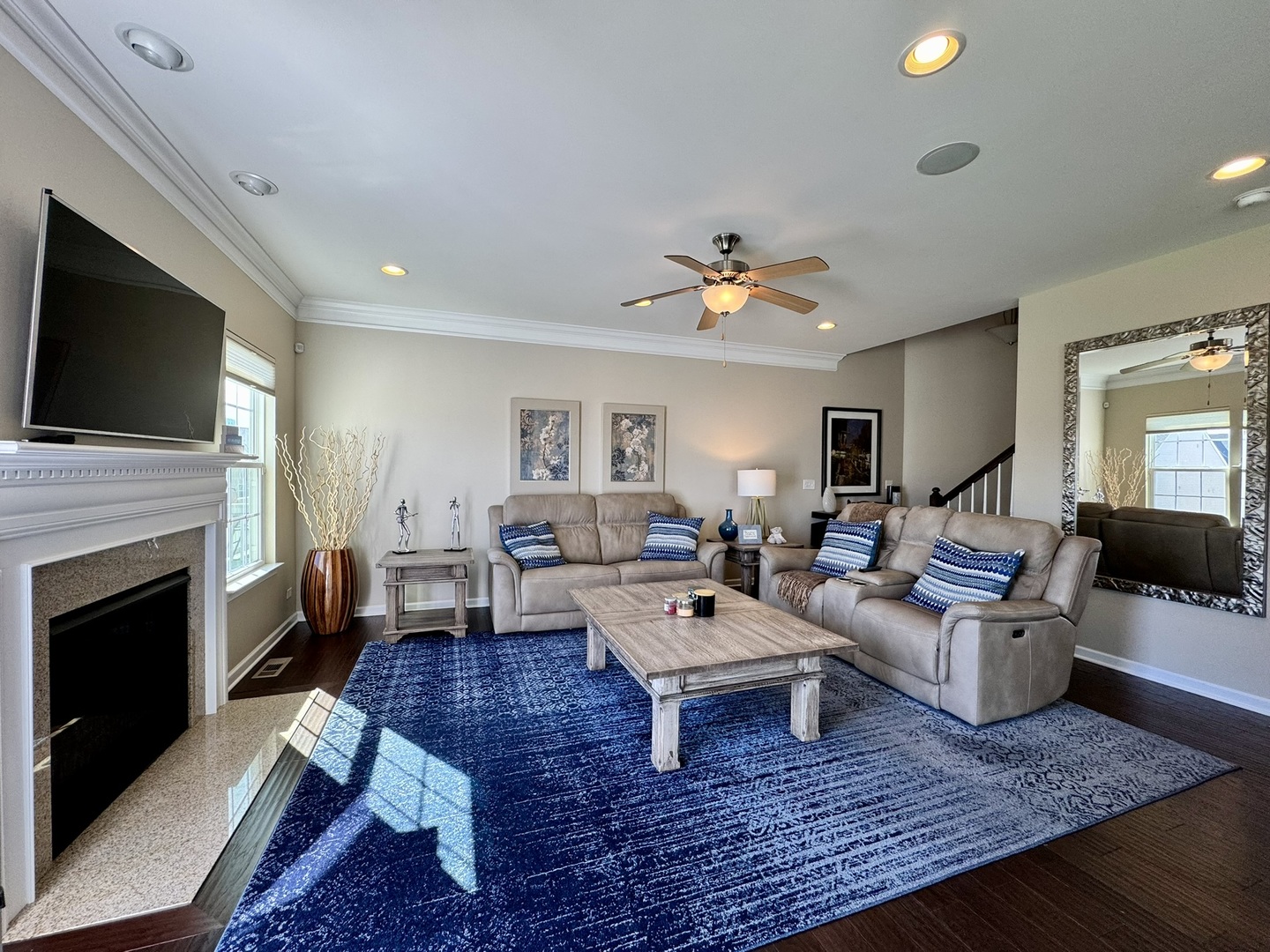 12903 Cypress Lane Plainfield, IL 60585 - Photo 3 of 30 a living room with furniture and a fireplace