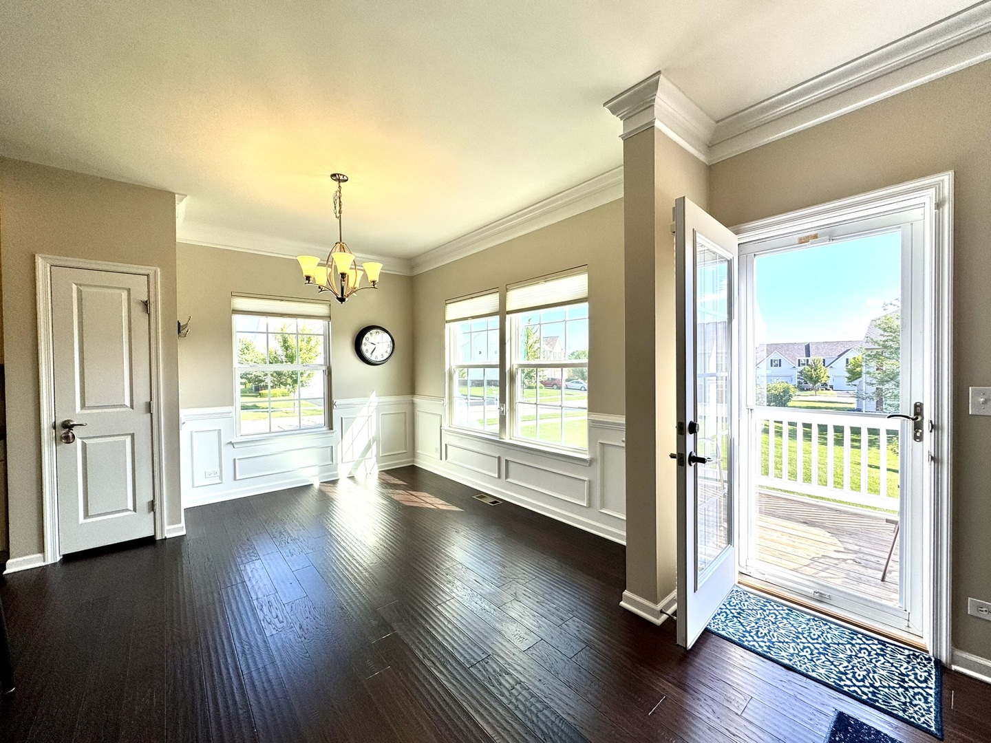12903 Cypress Lane Plainfield, IL 60585 - Photo 5 of 30 a view of an empty room with wooden floor and a window