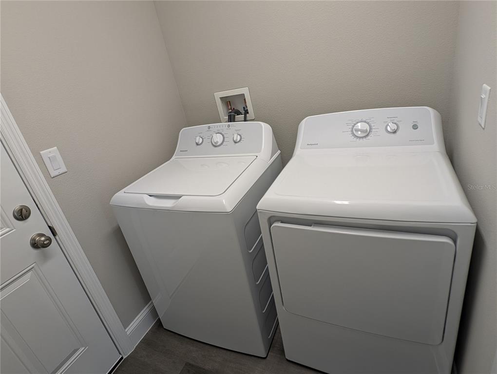 1225 Vanderway Lane Lady Lake, FL 32159 - Photo 12 of 13 a utility room with dryer and washer