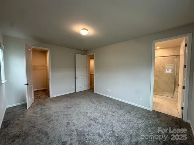 an empty room with a bathroom
