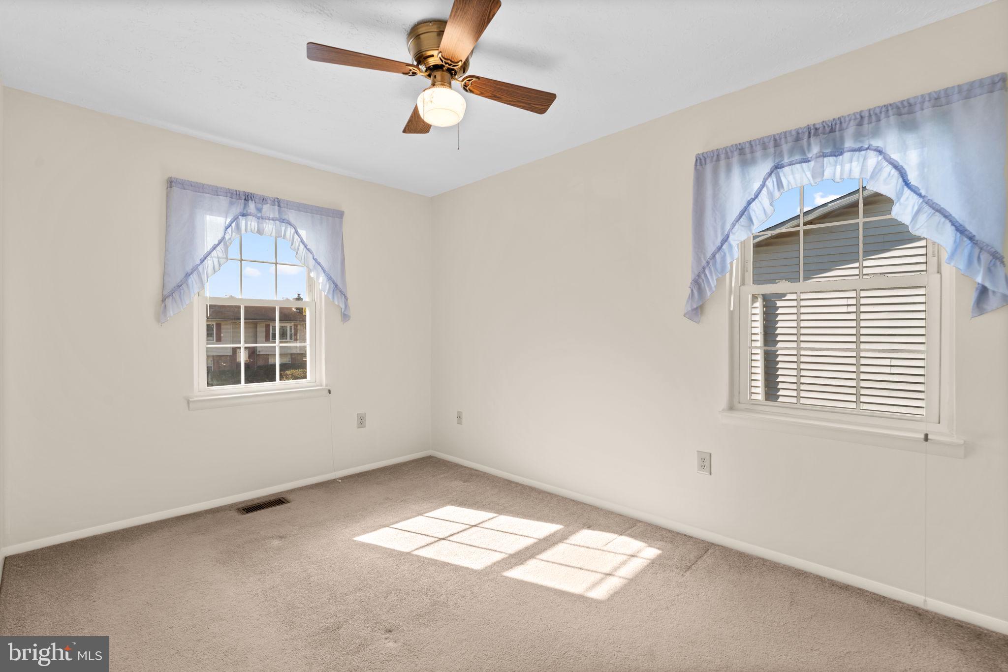 1818 Lasalle Place Severn, MD 21144 - Photo 17 of 30 a view of empty room with windows