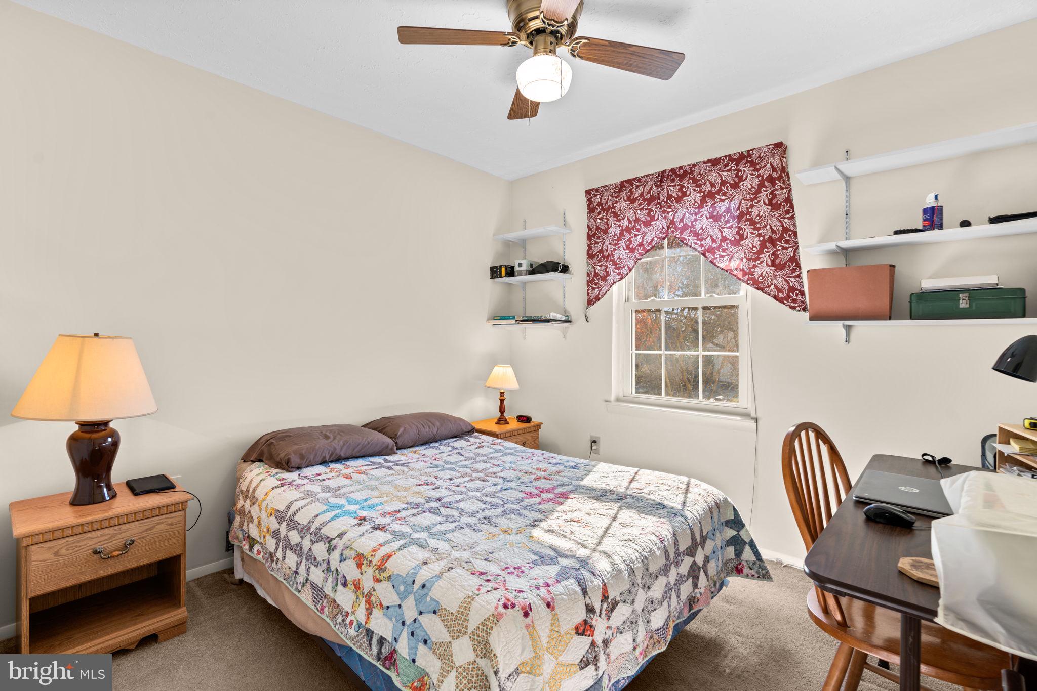 1818 Lasalle Place Severn, MD 21144 - Photo 19 of 30 a bedroom with bed and a window