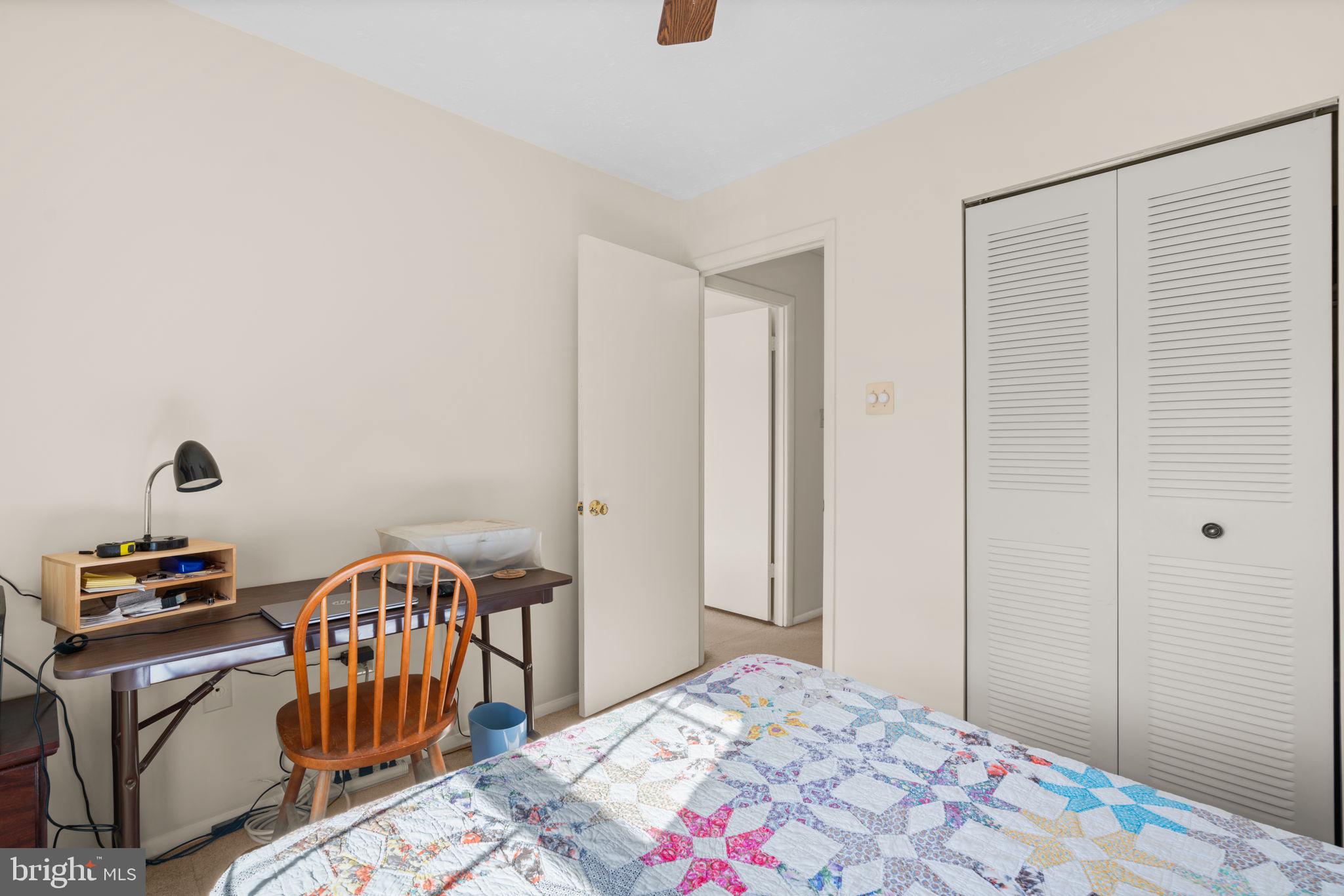 1818 Lasalle Place Severn, MD 21144 - Photo 20 of 30 a bedroom with a bed and a dresser