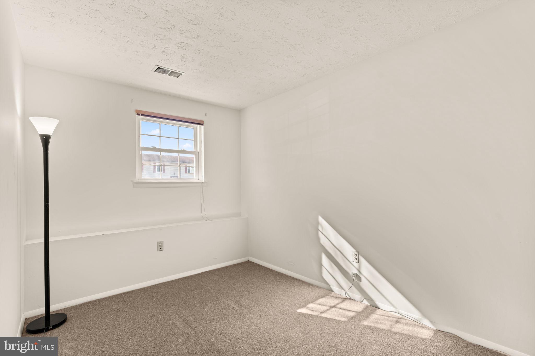 1818 Lasalle Place Severn, MD 21144 - Photo 21 of 30 a view of an empty room and a window