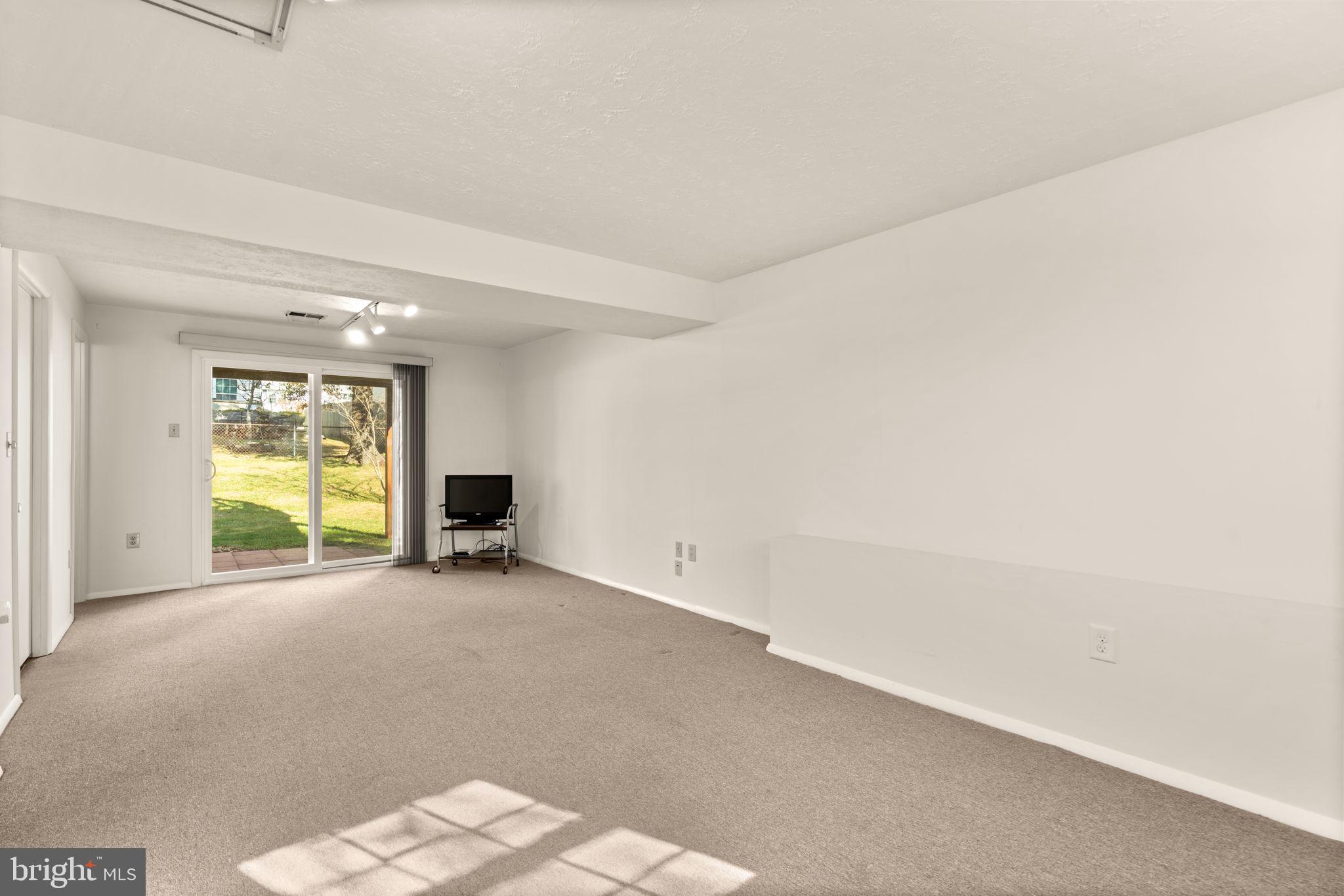1818 Lasalle Place Severn, MD 21144 - Photo 24 of 30 a view of an empty room with a window