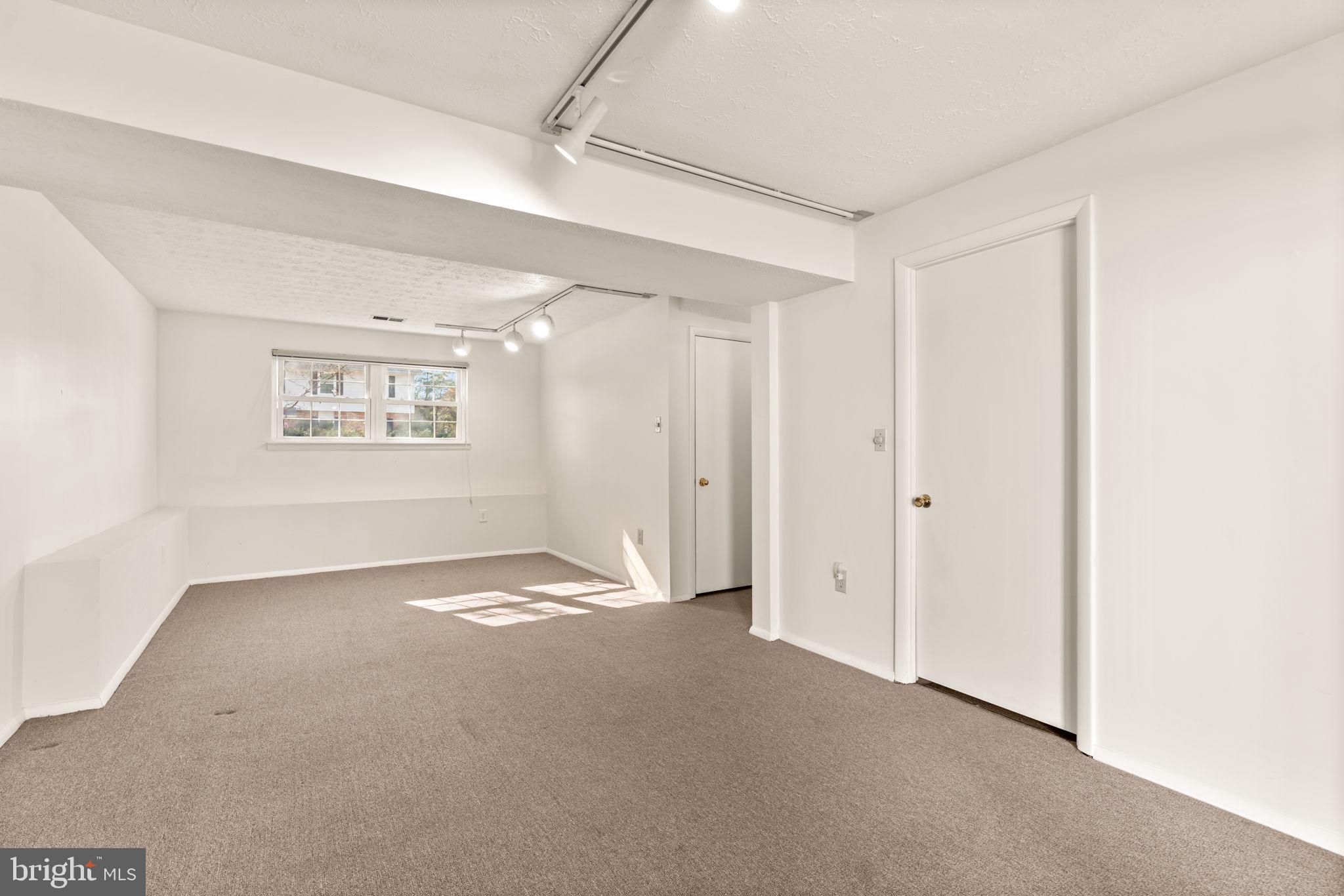 1818 Lasalle Place Severn, MD 21144 - Photo 26 of 30 a view of an empty room with a window