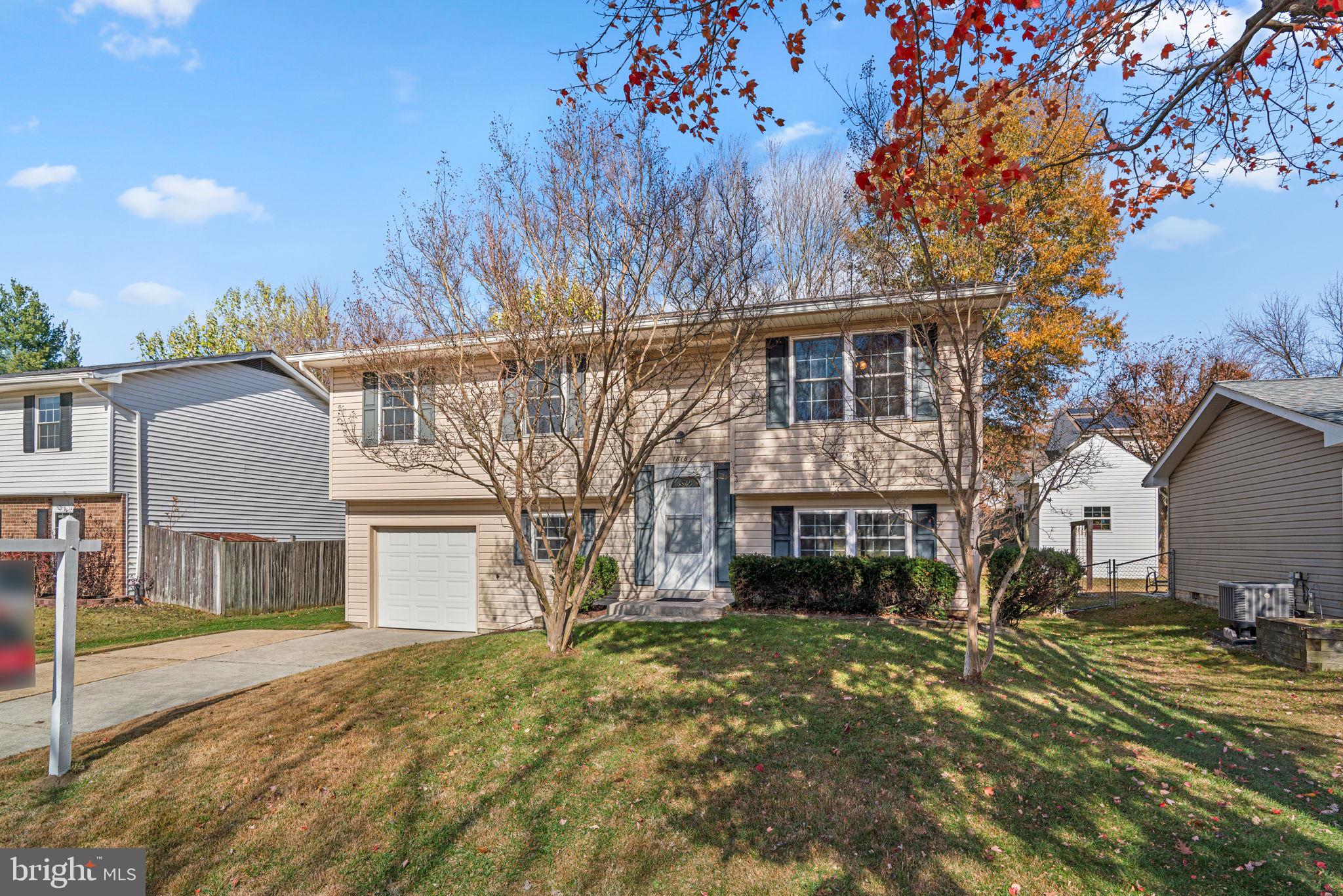 1818 Lasalle Place Severn, MD 21144 - Photo 3 of 30 a front view of a house with a yard