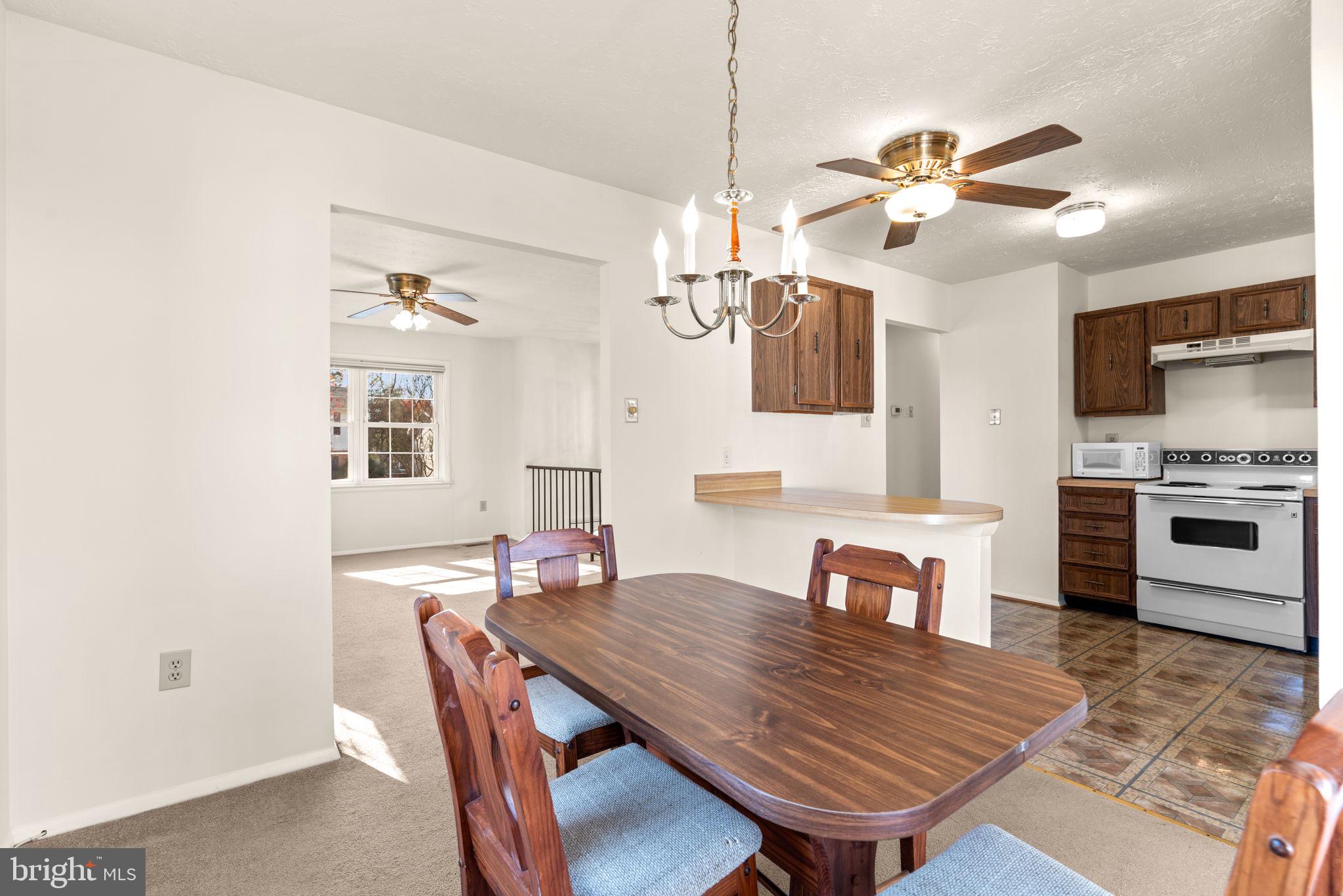 1818 Lasalle Place Severn, MD 21144 - Photo 8 of 30 a view of a dining room with furniture