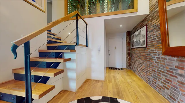 a view of entryway with a front door