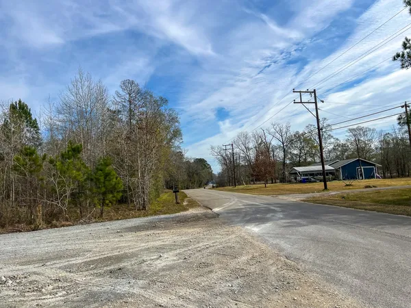 a view of road with trees