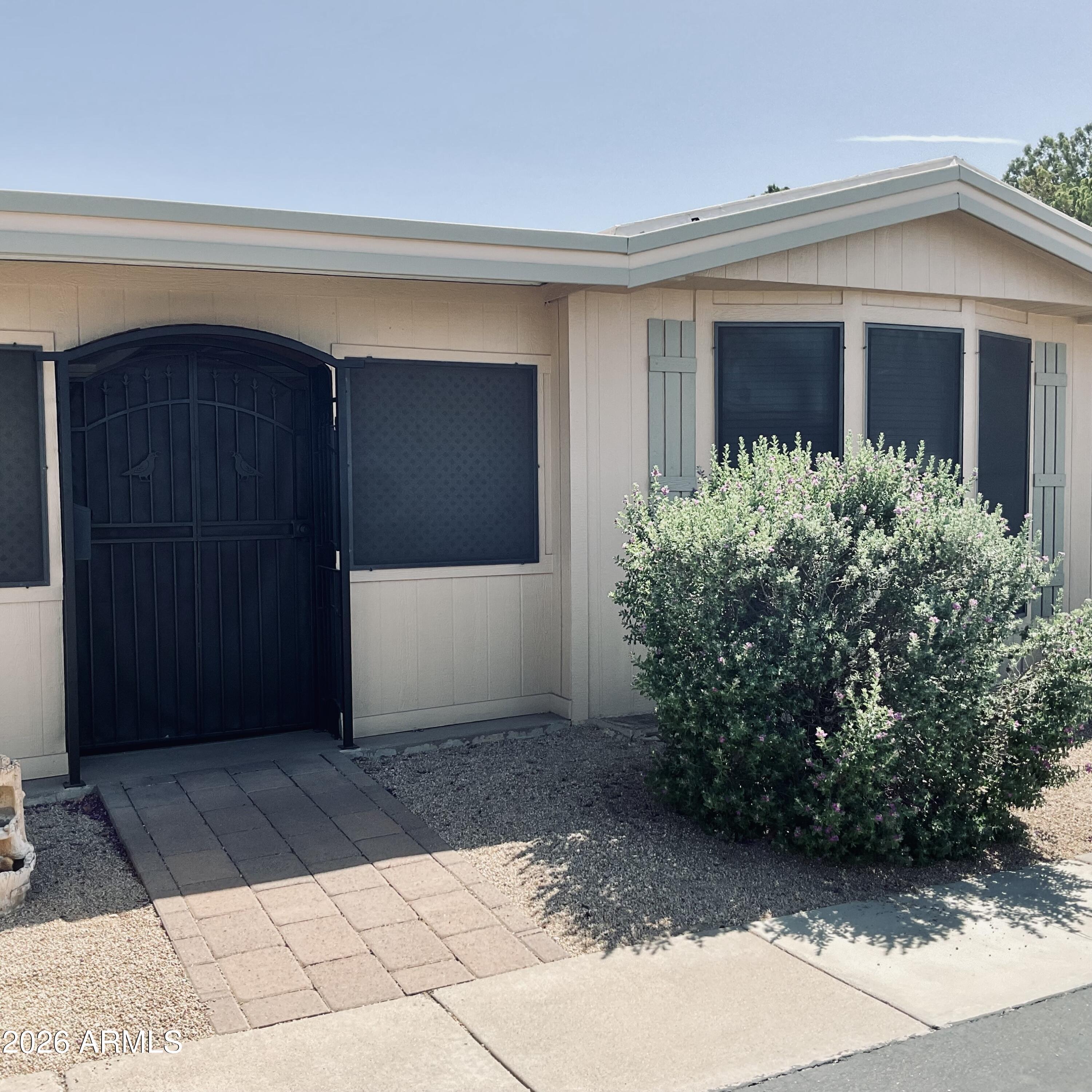 3036 East Utopia Road, Unit 52 Phoenix, AZ 85050 - Photo 7 of 36 Gated Front Entrance