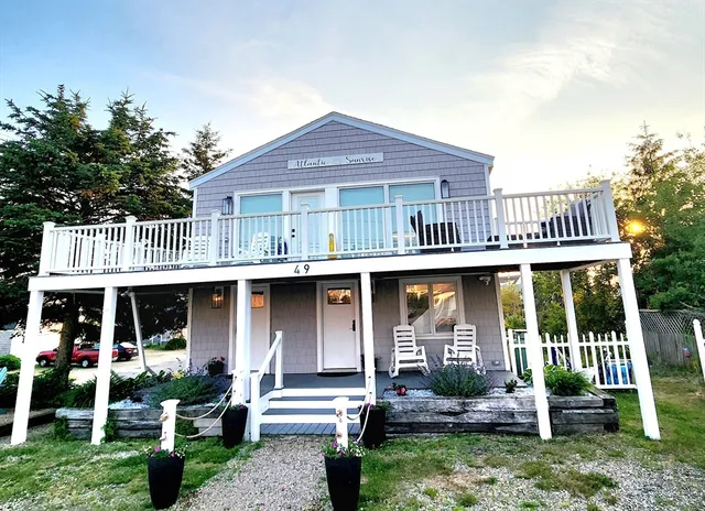 a front view of a house with porch