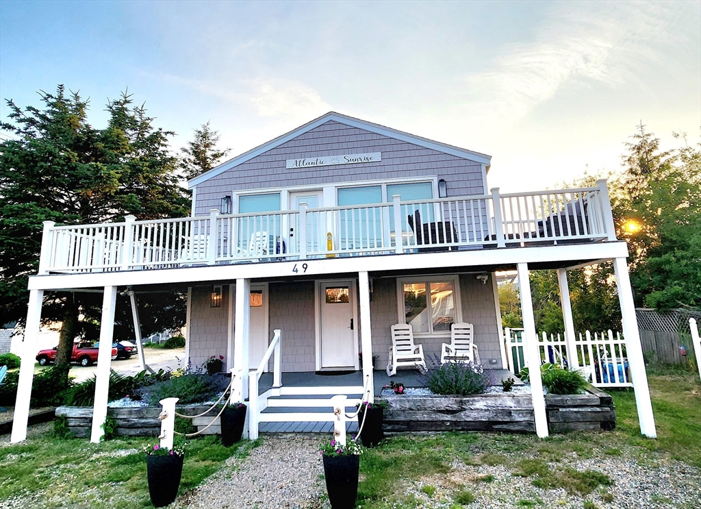 a front view of a house with porch