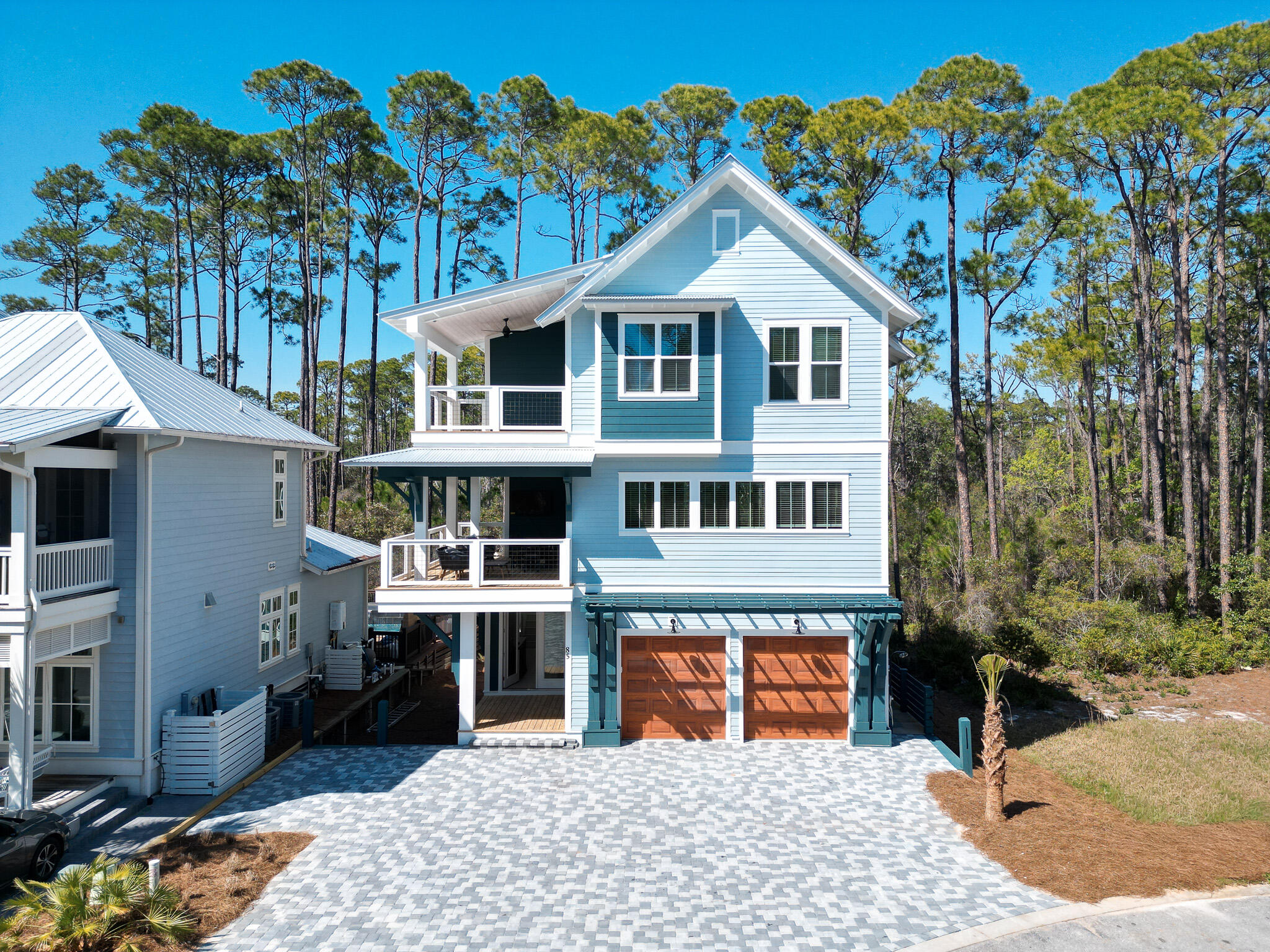 85 Silver Maple Drive Inlet Beach, FL 32461 - Photo 1 of 5 a front view of a house with a porch