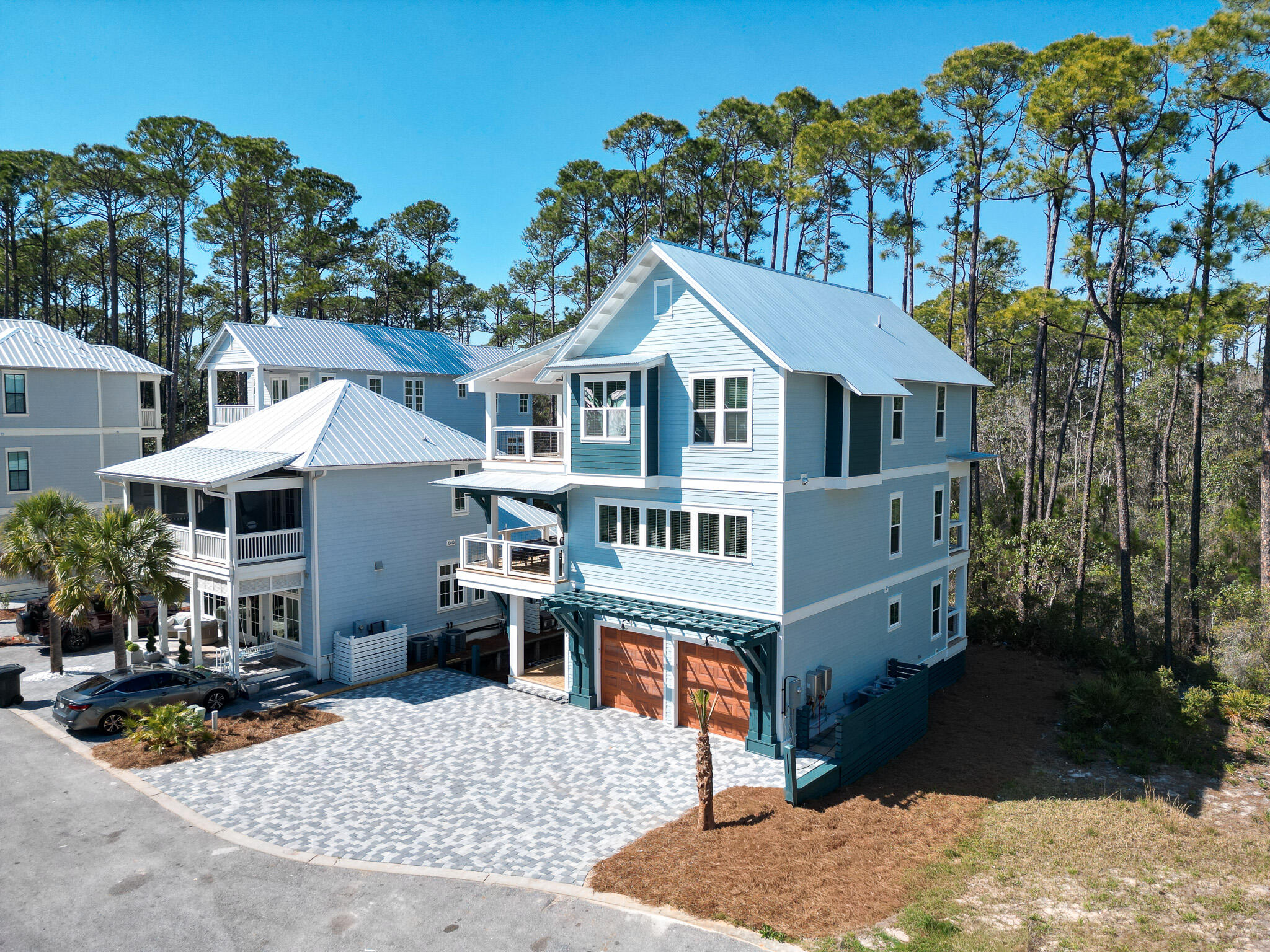 85 Silver Maple Drive Inlet Beach, FL 32461 - Photo 2 of 5 a front view of a house with a porch