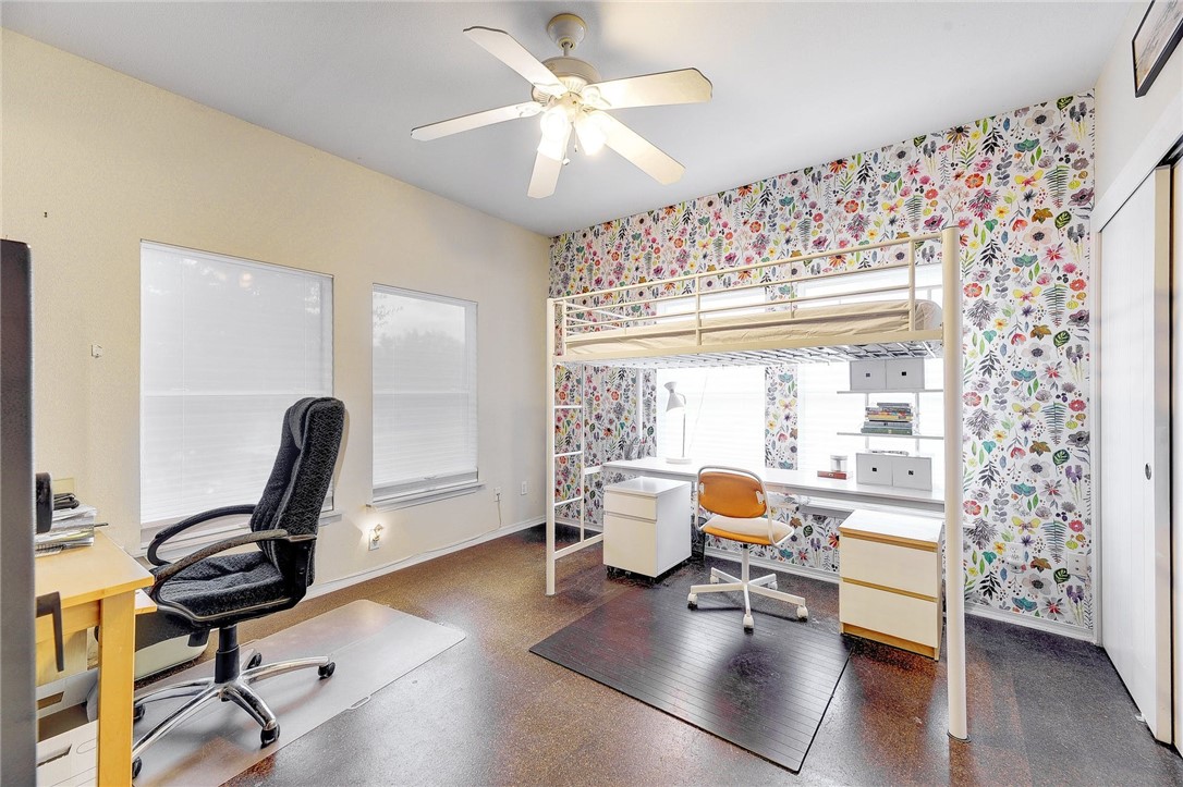604 Fletcher Street Austin, TX 78704 - Photo 22 of 35 a living room with furniture and a chandelier