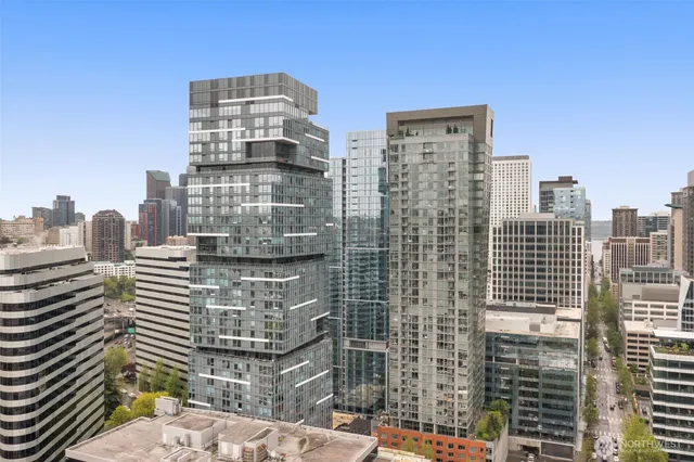 a view of a city with tall buildings