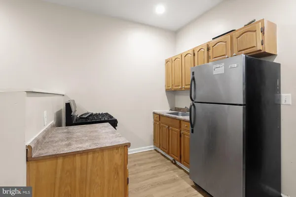 a bathroom with a bath tub with a shower
