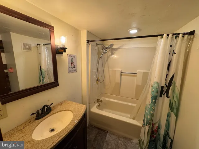 a kitchen with a stove and a sink