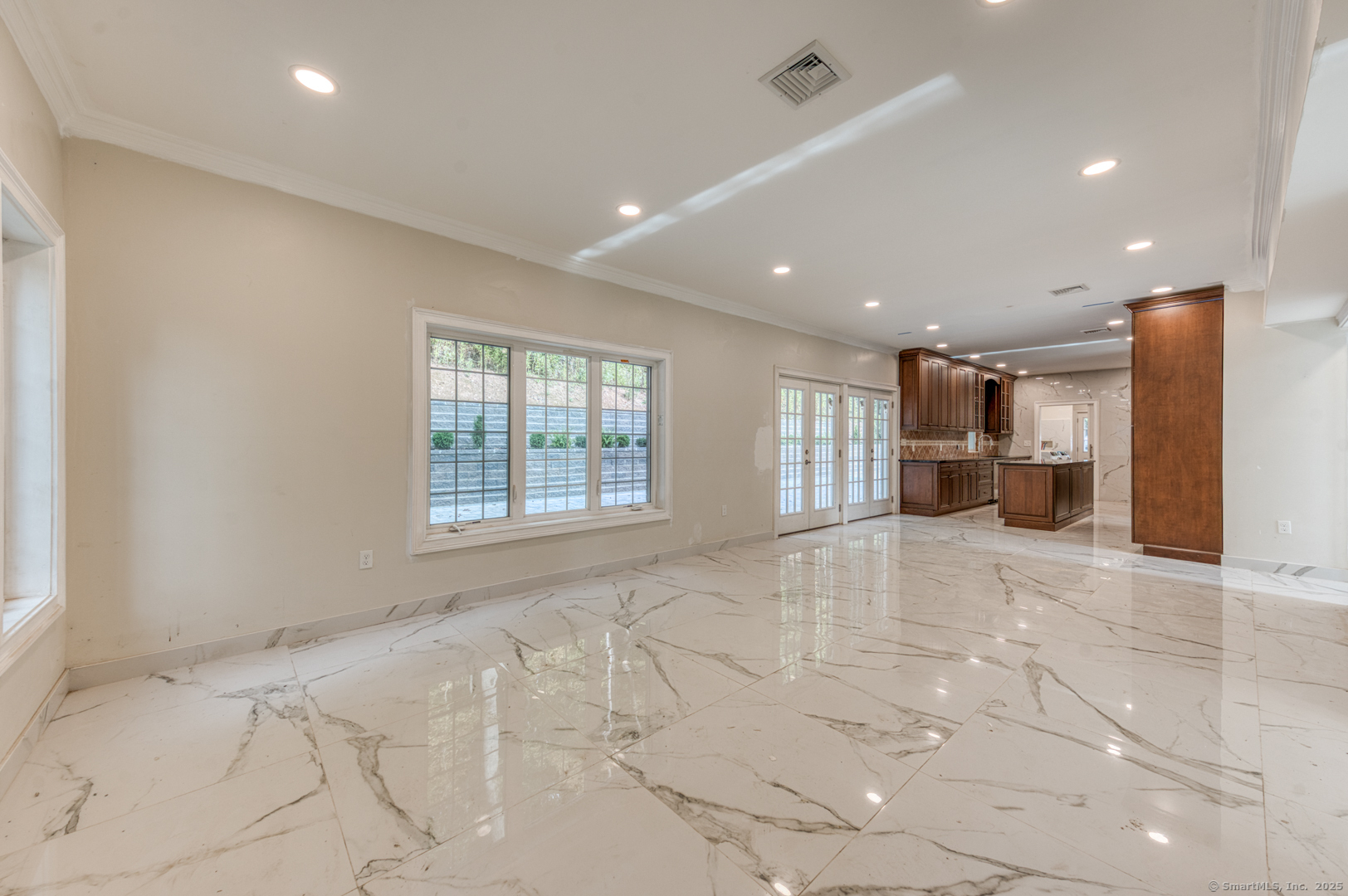171 Oregon Road Meriden, CT 06451 - Photo 11 of 38 a view of empty room with furniture and refrigerator