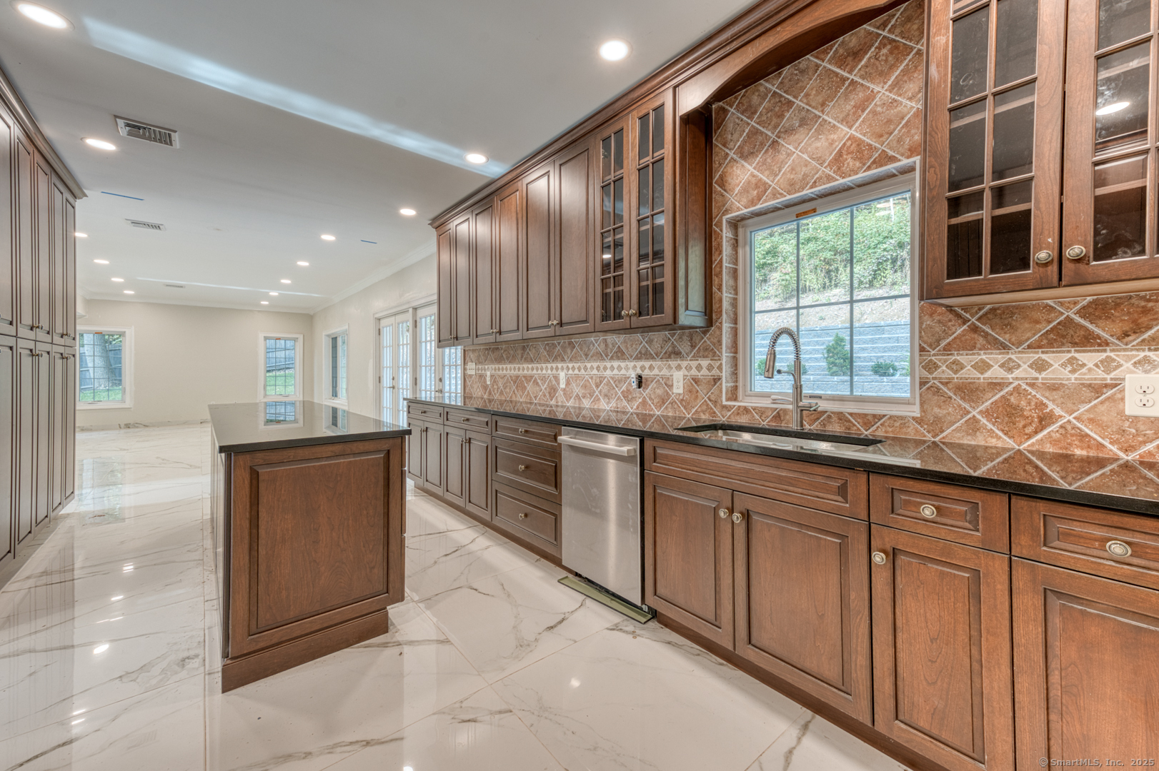 171 Oregon Road Meriden, CT 06451 - Photo 14 of 38 a large kitchen with stainless steel appliances granite countertop a stove a sink and a granite counter tops