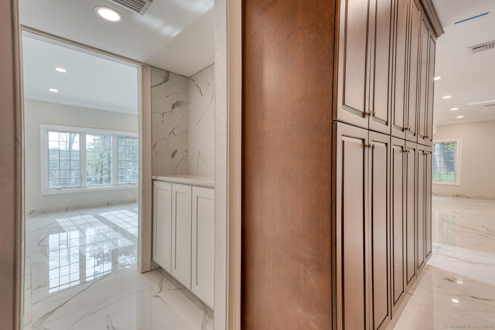 171 Oregon Road Meriden, CT 06451 - Photo 16 of 38 a view of entryway with wooden floor