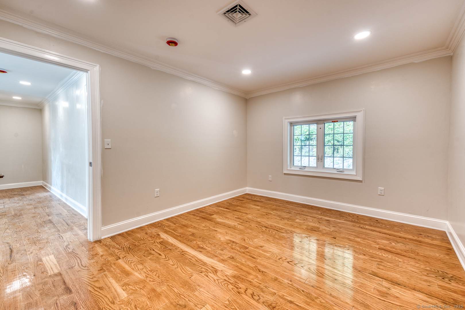 171 Oregon Road Meriden, CT 06451 - Photo 25 of 38 an empty room with windows and closet