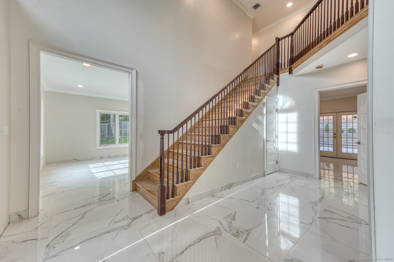 171 Oregon Road Meriden, CT 06451 - Photo 7 of 38 a view of entryway and hall with wooden floor