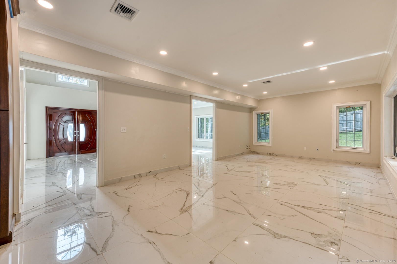 171 Oregon Road Meriden, CT 06451 - Photo 9 of 38 a view of livingroom with an empty space