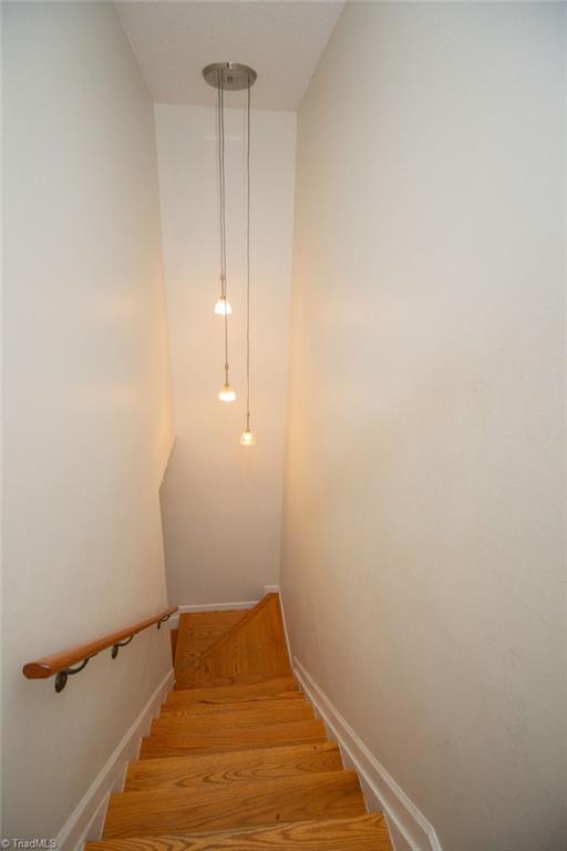 2218 Shadow Valley Road High Point, NC 27265 - Photo 10 of 25 Stairwell to upstairs living