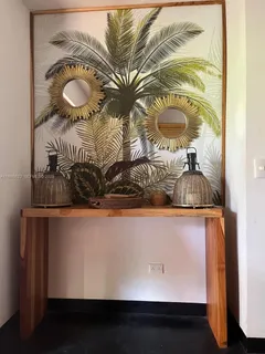 a room with a table and chairs