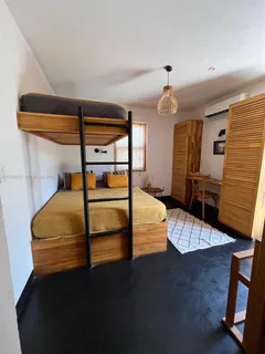 a view of park with large trees