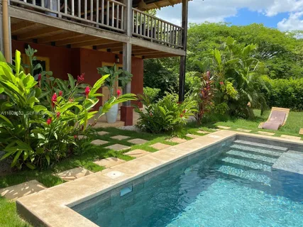 a view of a porch with a yard