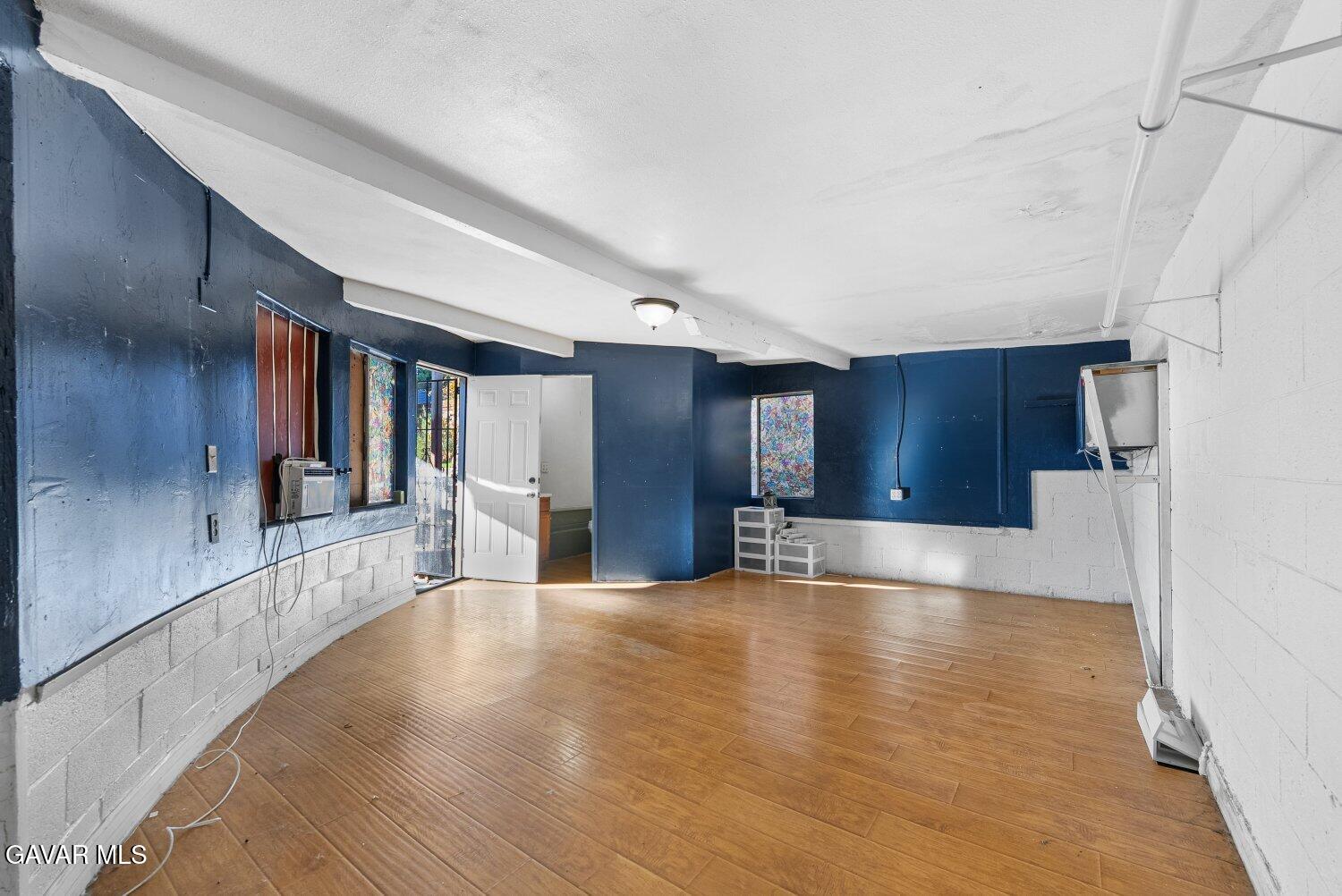 44221 4th Street East Lancaster, CA 93535 - Photo 44 of 68 a view of a kitchen with a sink and a refrigerator
