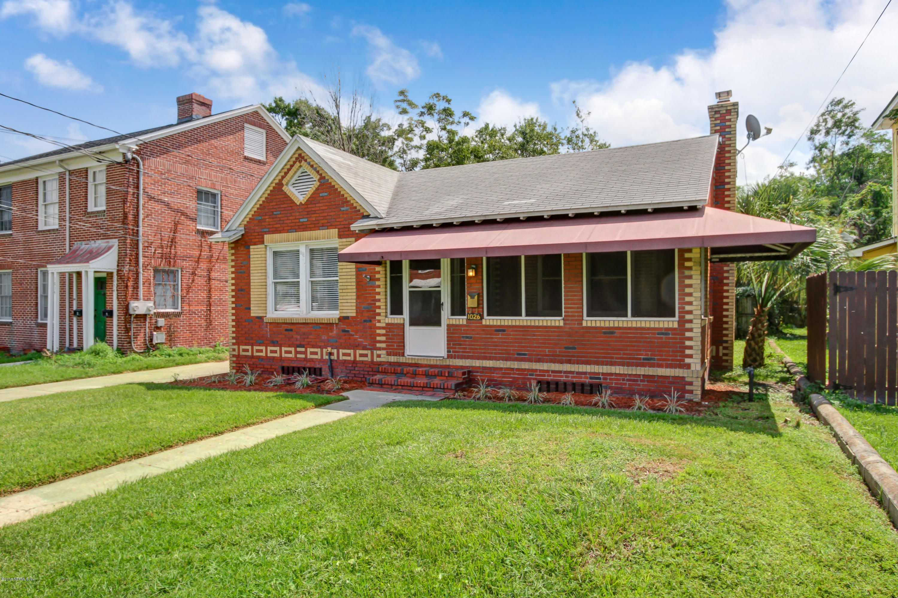 1026 Riviera Street Jacksonville, FL 32207 - Photo 2 of 48 a view of house with a yard