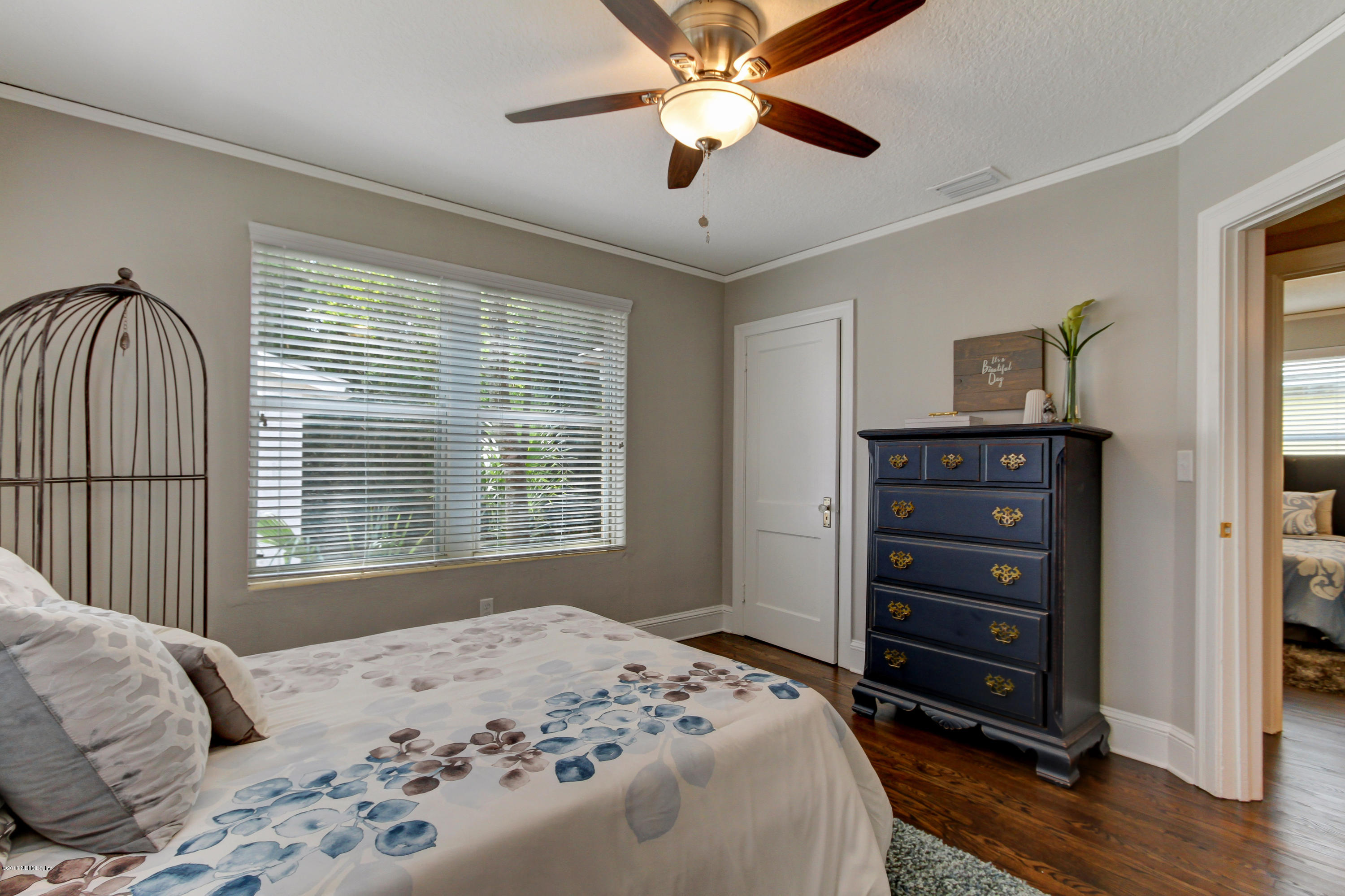 1026 Riviera Street Jacksonville, FL 32207 - Photo 36 of 48 a bedroom with a bed and a dresser