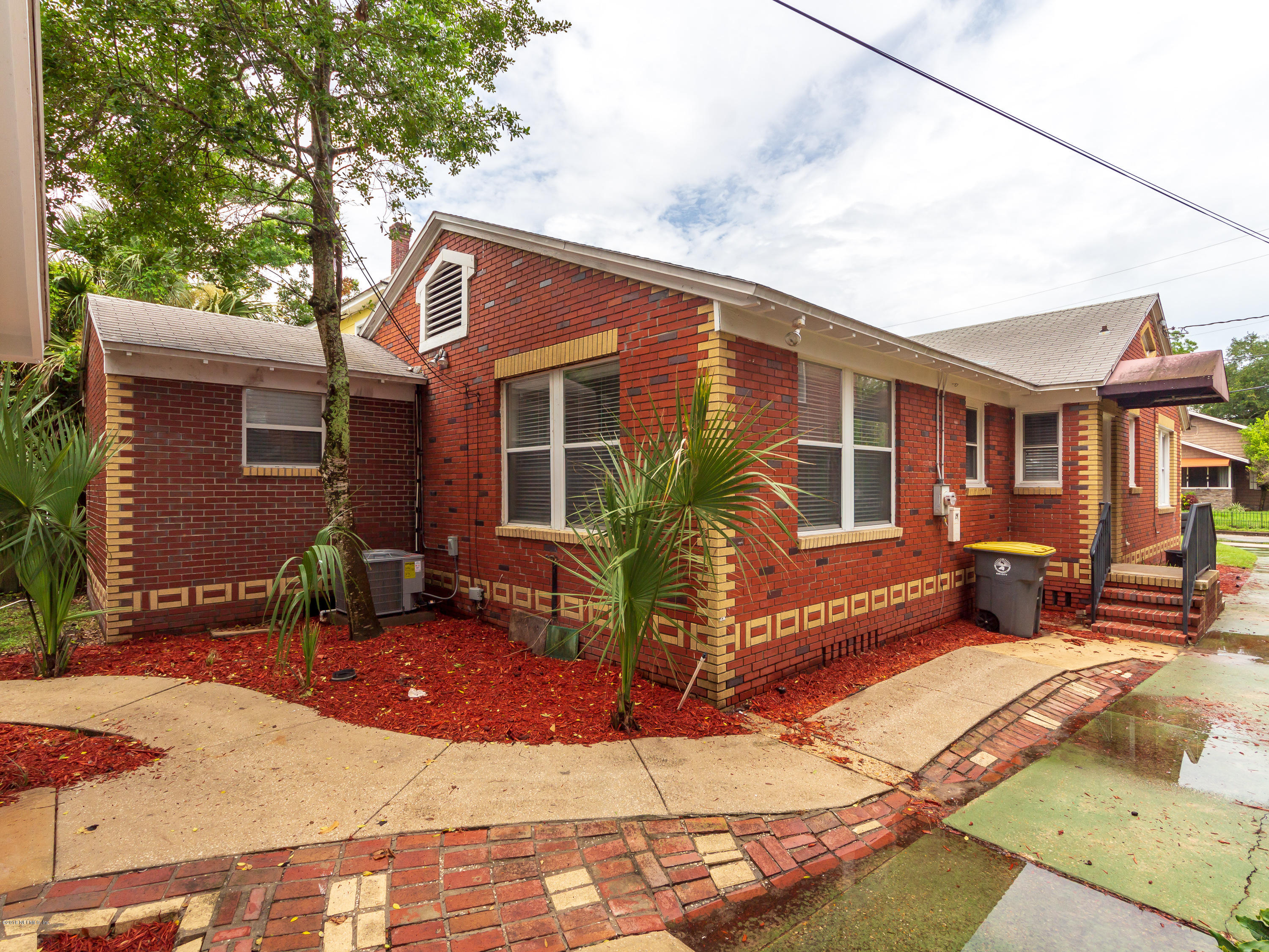 1026 Riviera Street Jacksonville, FL 32207 - Photo 39 of 48 a view of a house with backyard and sitting area