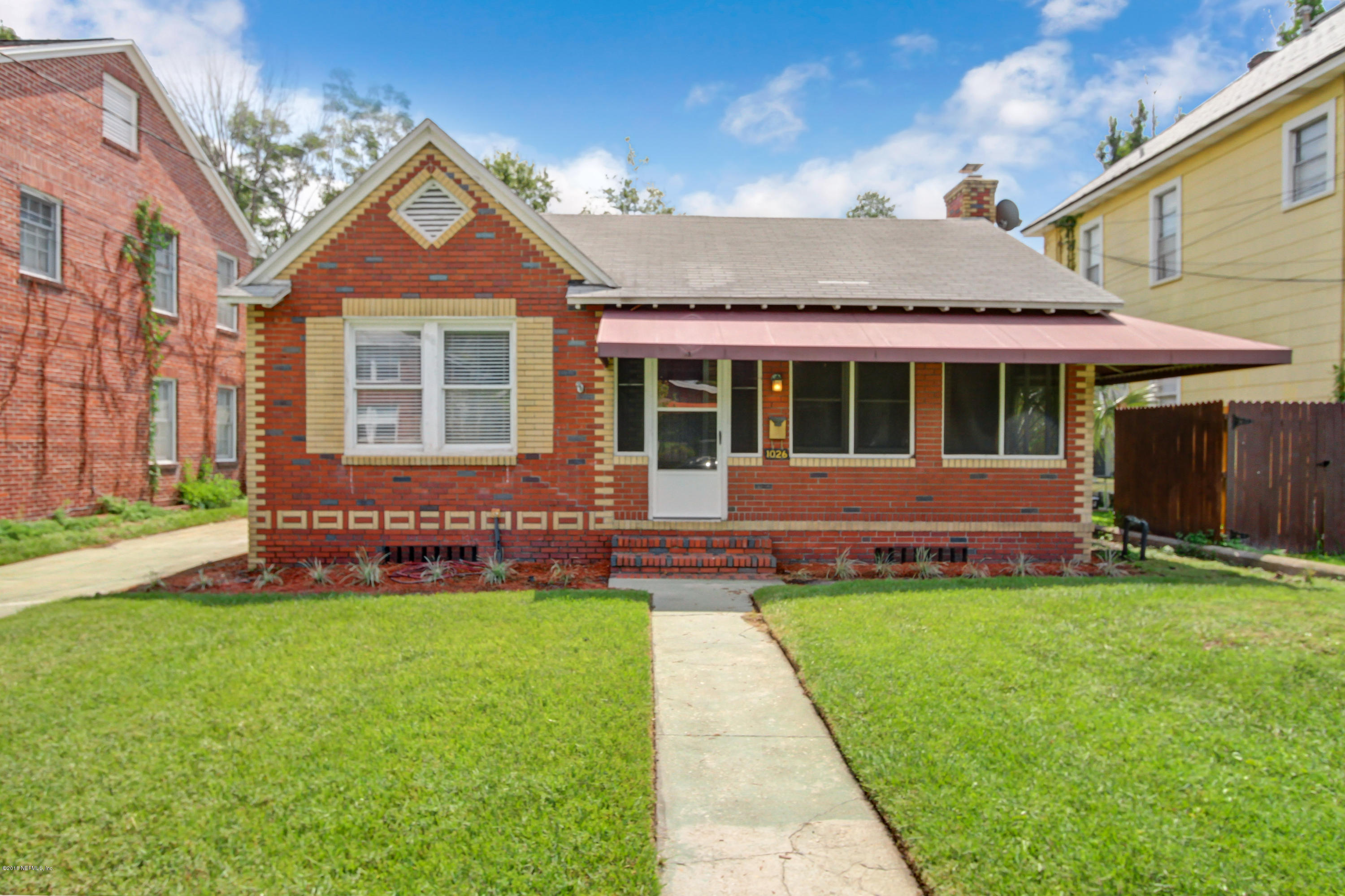 1026 Riviera Street Jacksonville, FL 32207 - Photo 45 of 48 front view of a house with a yard