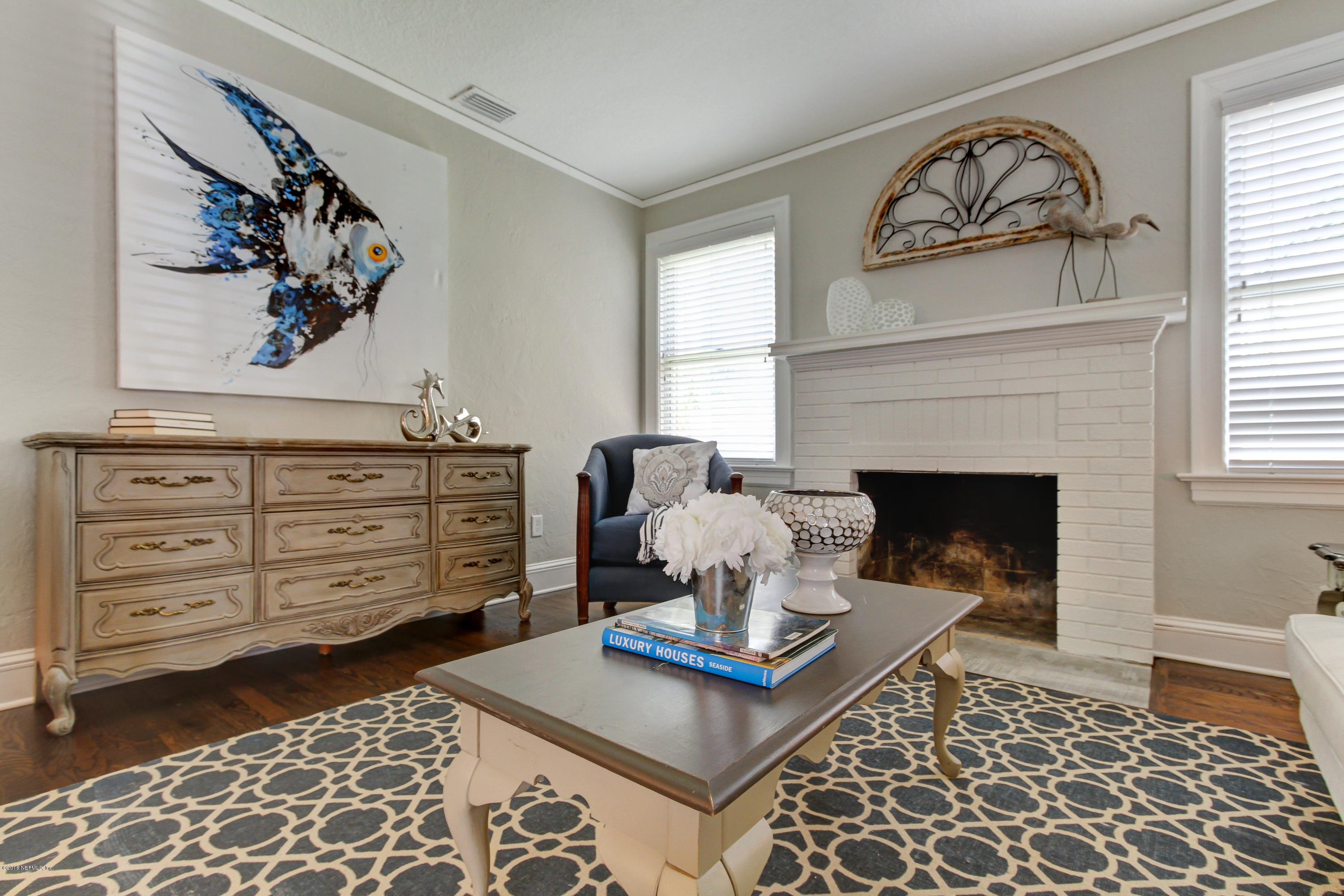 1026 Riviera Street Jacksonville, FL 32207 - Photo 8 of 48 a living room with furniture and a fireplace