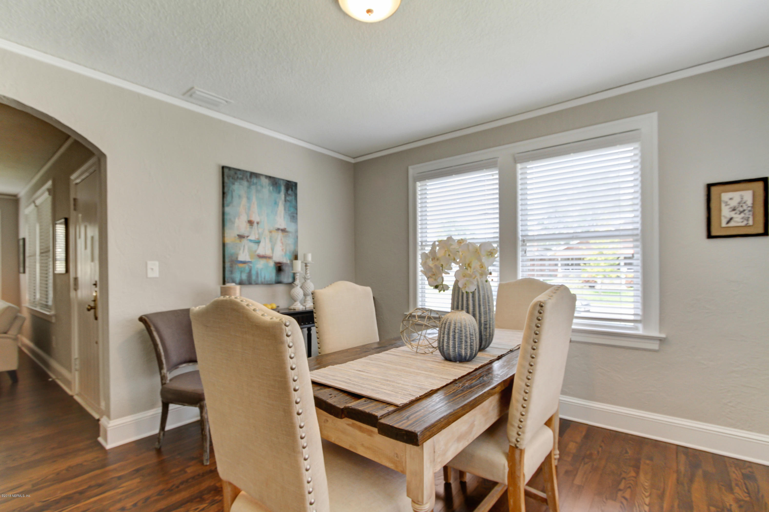 1026 Riviera Street Jacksonville, FL 32207 - Photo 9 of 48 a view of a dining room with furniture window and wooden floor