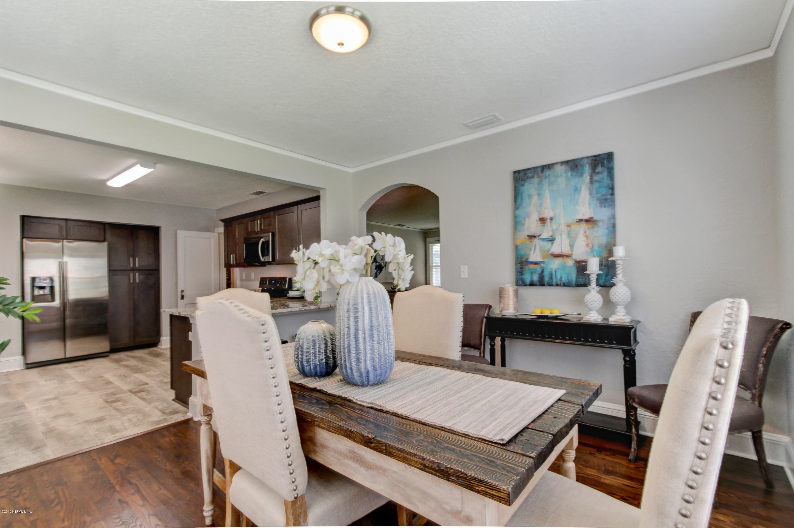 1026 Riviera Street Jacksonville, FL 32207 - Photo 10 of 48 a living room with furniture and a wooden floor