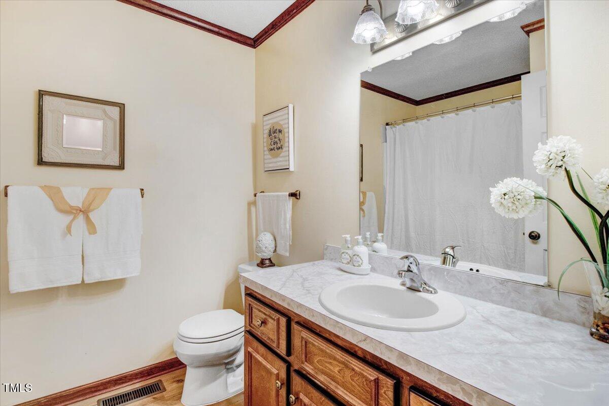 1860 Little Devine Road Selma, NC 27576 - Photo 24 of 46 Hall Bathroom