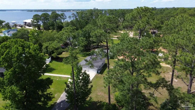 a view of a lake with a building in the background
