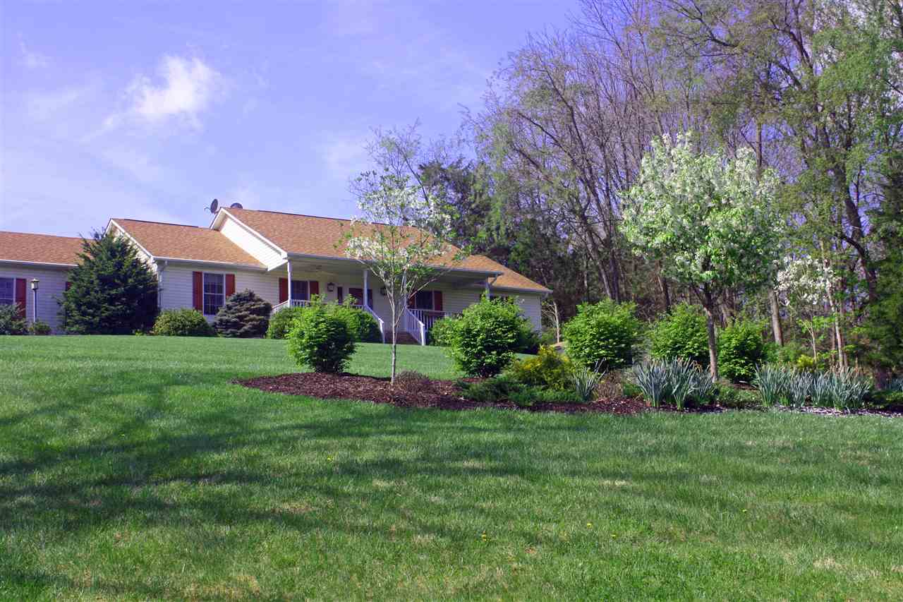 154 Raintree Road Verona, VA 24482 - Photo 1 of 49 a view of a house with a big yard and potted plants