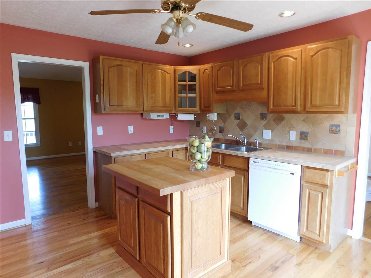 154 Raintree Road Verona, VA 24482 - Photo 13 of 49 a kitchen with a stove window and cabinets