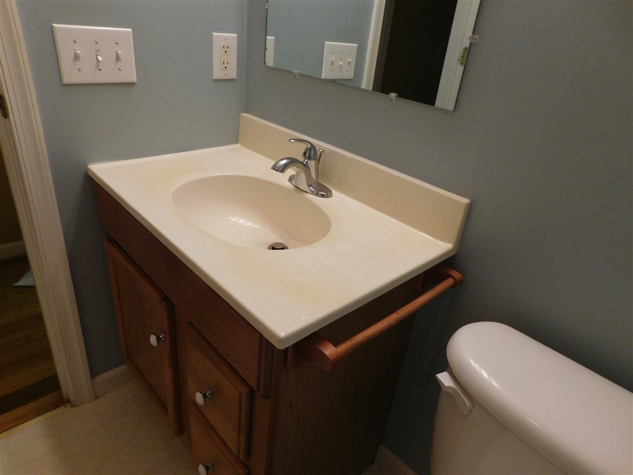 154 Raintree Road Verona, VA 24482 - Photo 29 of 49 a bathroom with a sink a toilet and a mirror
