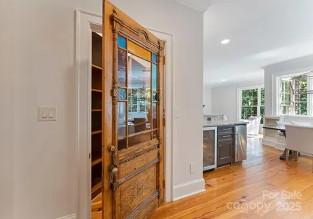 a view of a living room and balcony