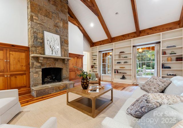 a view of two chairs in the balcony